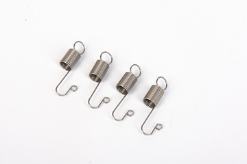 The mechanical spring hooks commonly used in life are on the white background