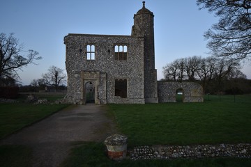 The outer gatehouse of Baconsthorpe Castle, a ruined manor house in Norfolk, England, UK.