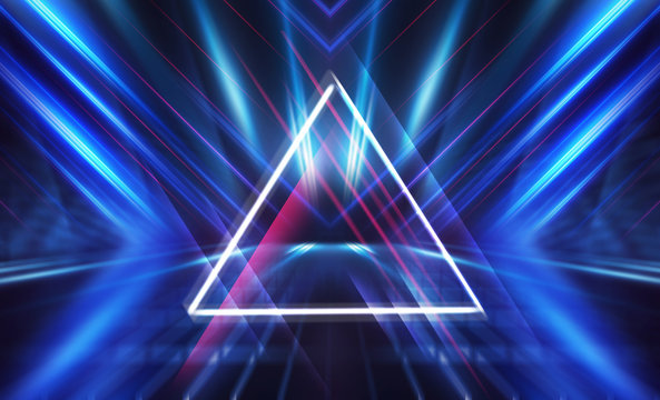 Dark abstract futuristic background. The geometric shape of a triangle in the middle of the scene. Neon blue-pink rays of light on a dark background © Laura Сrazy