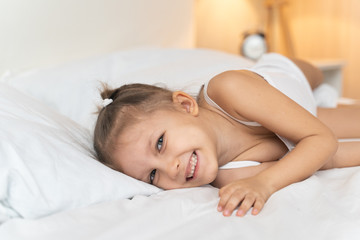 Obraz na płótnie Canvas girl resting in bed