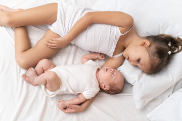 Fototapeta na wymiar Girl and a newborn