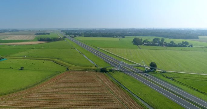 The Slachtetille Suspension Bridge Crossing the A31 Highway, Part of the Slachtemarathon, Franeker, Friesland, The Netherlands &ndash; 4K Drone Footage