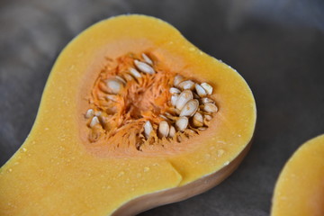 Sliced, fresh organic pumpkin with seeds. 