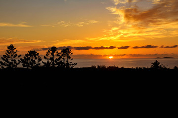 Fototapeta na wymiar Vivid sunset over the sea at Yeppoon, Queensland, Australia