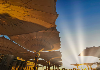 Medina, Saudi Arabia - August 25, 2019: Sunrise or golden hour view during haze weather at Nabawi...