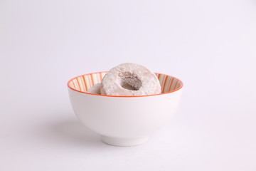 homemade bagel with sugar in bowl