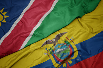 waving colorful flag of ecuador and national flag of namibia.