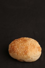 delicious bread rolls on colored background