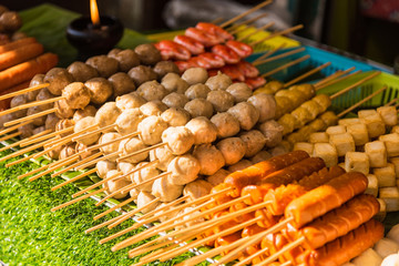 Meatballs with bamboo, wood stick. Traditional Street Food Thailand.