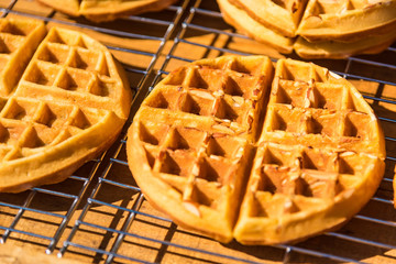 Tasty sweet waffles in street food.