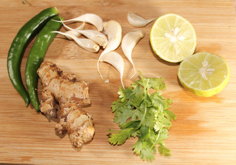 A set of Refresh items on the table, green, yellow. Ginger Garlic, chilli 