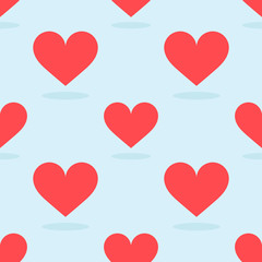 Red hearts on blue background pattern.