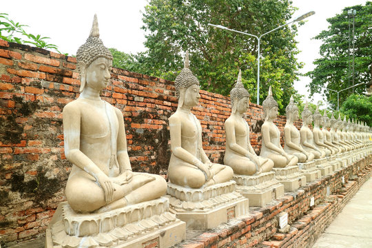 Row of the Buddha Images in Around the Inside Wall of Wat Yai Chai Mongkhon Ancient Temple, Ayutthaya Historical Park, Thailand