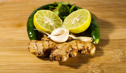 A set of Refresh items on the table, green, yellow. Ginger Garlic, chilli 