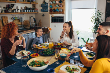 family dinner party at home. vegetarian dinner. vegan food concept