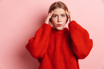 Serious young woman posing isolated