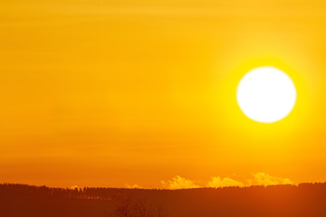 Sun closeup during a clear sky winter sunrise.