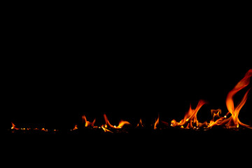 On fire flames at the black background