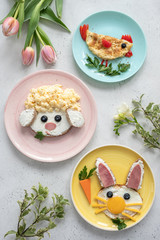 Colorful breakfast meal for kids. Funny Easter food art, top view.