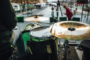 Drumset in close up view on stage, drummer playing set on stage