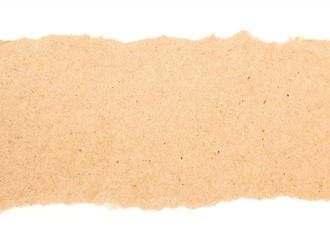 Closeup torn brown cardboard paper on white background. Cardboard stripe for advertising text...