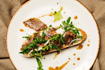 Delicious Bruschetta. Traditional italian cuisine appetizer. Food and menu concept.