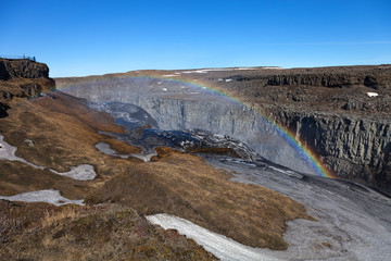 Stormy water and dirty spring snow. Beautiful view to the Dettifoss waterfall in Iceland