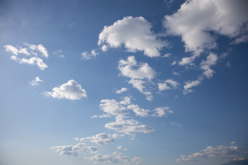 fluffy clouds and blue sky