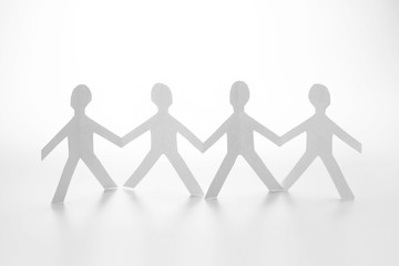 human chain paper doll on white