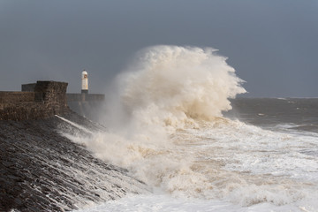 Fototapeta na wymiar Storm Ciara reaches the Welsh coast Massive waves as storm Ciara hits the coast of Porthcawl in South Wales, United Kingdom