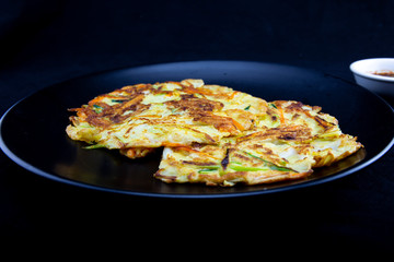 Cuttlefish, zucchini, spring onion and carrot pancake