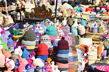 Caps, bags and all kind of stuff at Moroccan souks and markets in the streets