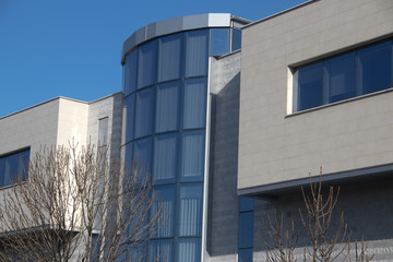 Urban metropolis modern architecture. Exterior with glass walls, reflecting surrounding buildings. Brand new buildings for business and office purposes. Belgrade, Serbia, 09.02.2020