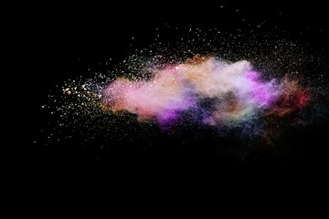 Abstract powder splatted background. Colorful powder explosion on black background. Colored cloud. Colorful dust explode. Paint Holi.