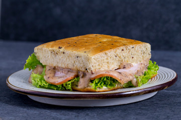 turkey sandwich with cheese and vegetables 