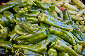 a lot of green peppers on the pile at Moroccan berber market