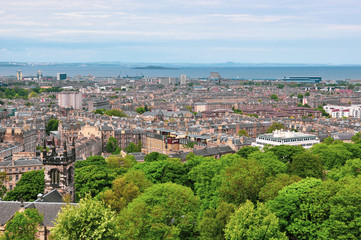 Fototapeta na wymiar Cityscape shot of Edinburgh city, Leith district and harbour taken from Calton Hill