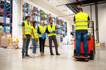 Training on a forklift, managers and workers