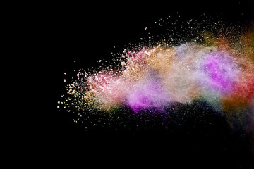 Abstract powder splatted background. Colorful powder explosion on black background. Colored cloud. Colorful dust explode. Paint Holi.