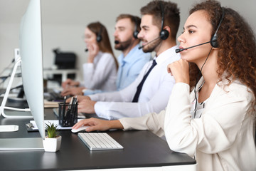 Technical support agents working in office