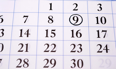 date in a black circle in the calendar