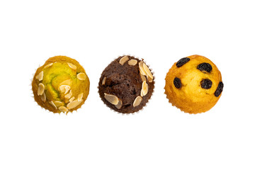 Top view of delicious homemade muffins isolated on white background.