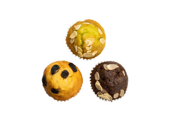 Top view of assorted muffins isolated on white background.