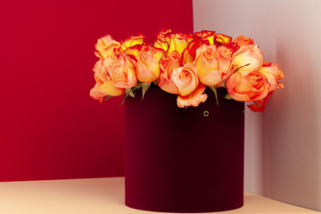 Hat box with beautiful bouquet of roses