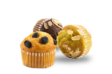 Different kinds of freshly baked banana muffins on white background with clipping path.