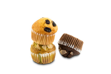 Different kinds of freshly baked muffins on white background with clipping path.