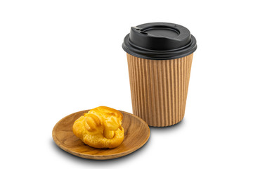 Eclair in a wooden plate and take home coffee on white background with clipping path.