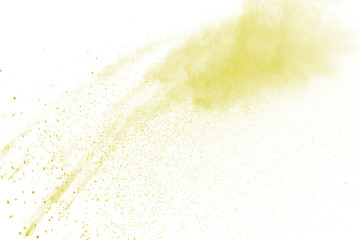 Yellow powder explosion on white background. Colored cloud. Colorful dust explode. Paint Holi.