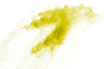 Yellow powder explosion isolated on white background.