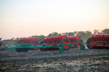 Farmer seeding crops at field